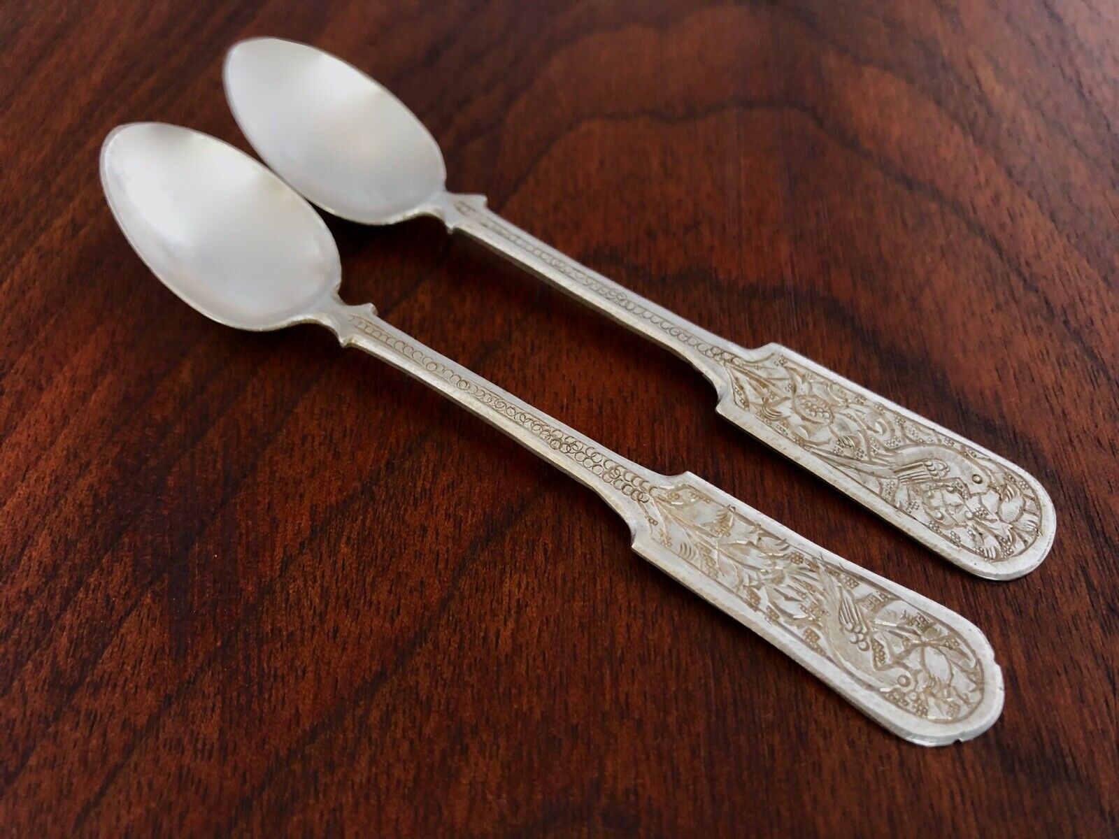 - (2) Persian  875 Silver Demitasse Spoons: Fiddle Pattern Engraved Birds